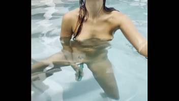 Melena Maria Rya playing naked in public pool